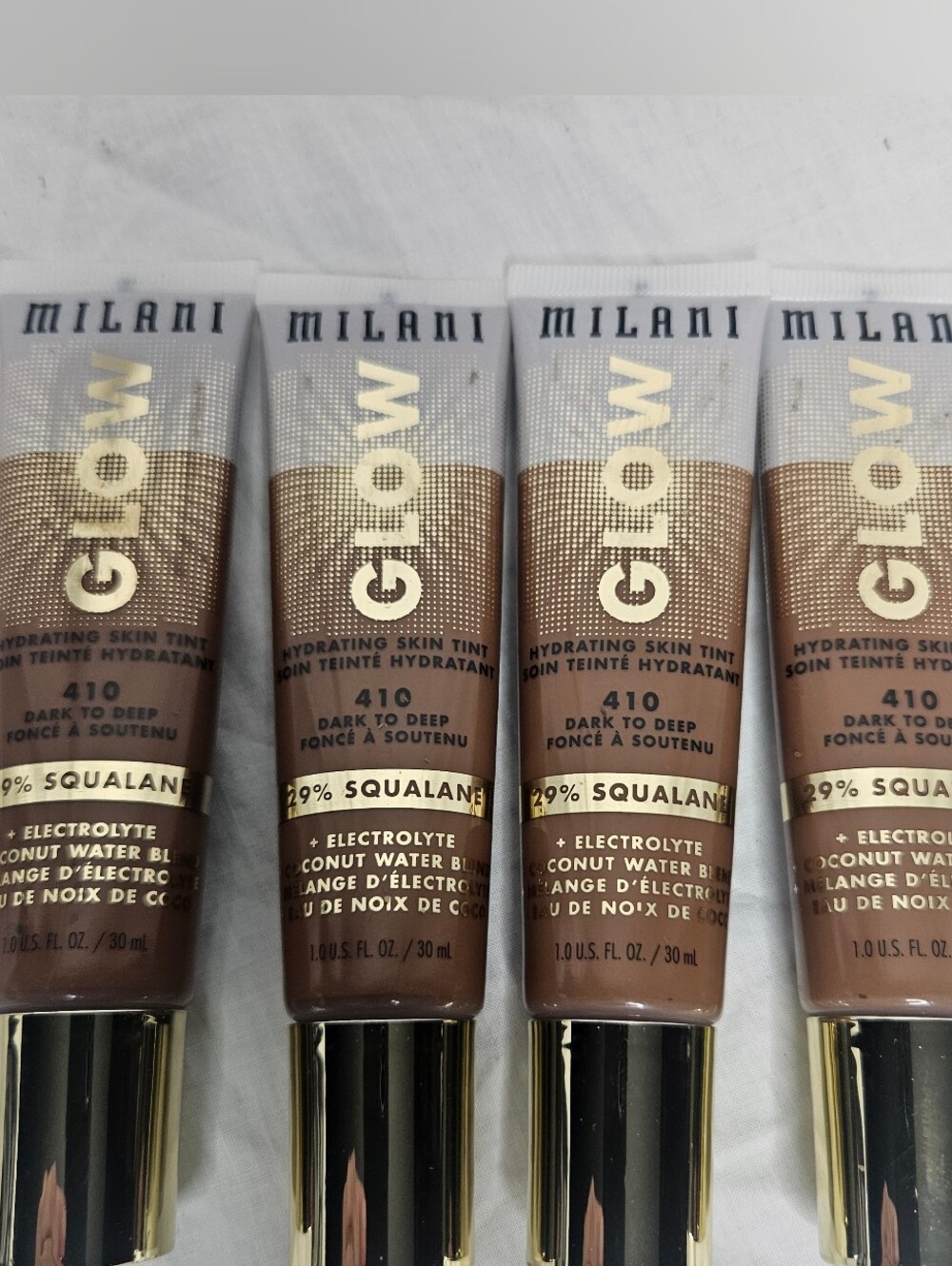 Lot Of 4 Milani Glow Hydrating Skin Tint 1 oz Sealed 410 Dark To Deep